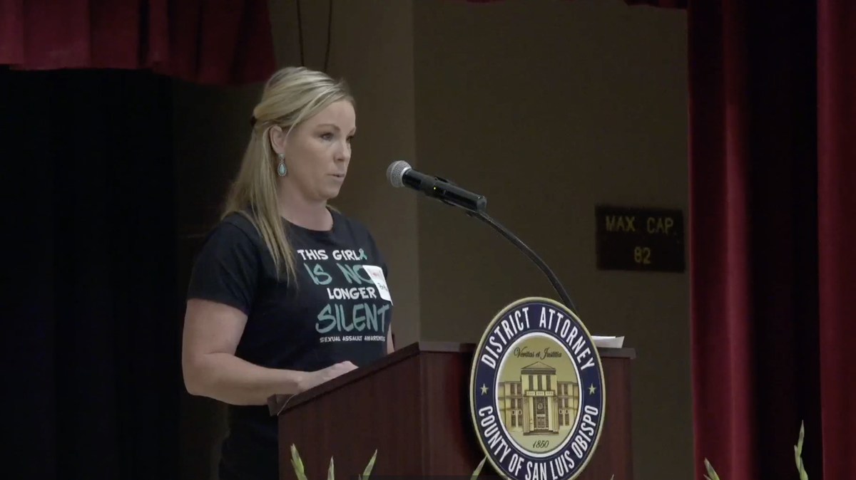 Brittany Barber, a survivor a childhood sexual assault, speaks at a Victims Rights Awareness Month event at San Luis Obispo Veterans Hall on April 17, 2023.