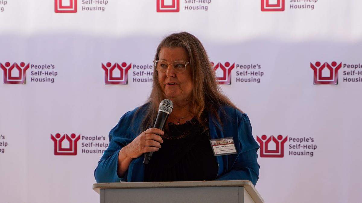 Corki Clark-Henderson speaks during the groundbreaking ceremony for Cleaver & Clark Commons on Feb. 28, 2024. The Housing Authority of San Luis Obispo and People’s Self-Help Housing joint project will add more than 50 affordable units to Grover Beach.
