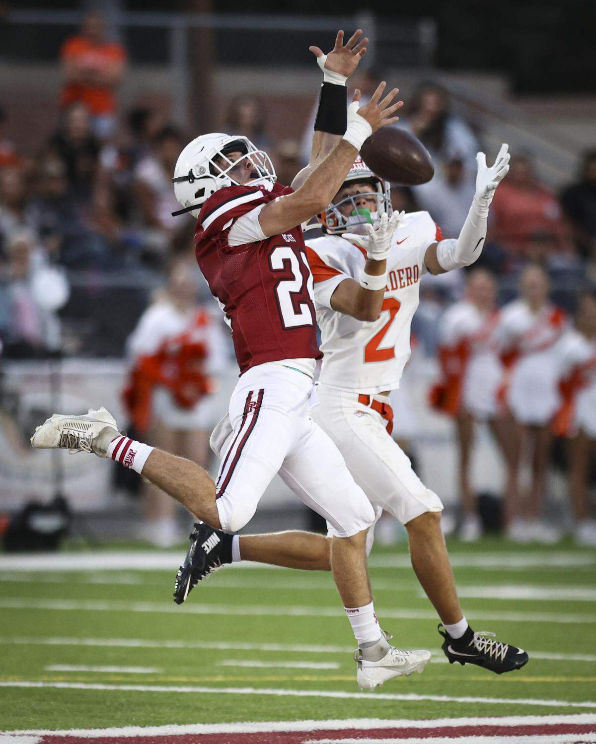 Matthew Ammann breaks up a pass intended for Tyson Tenhaeff. Paso Robles beat Atascadero 49-14 on Sept. 19, 2025.