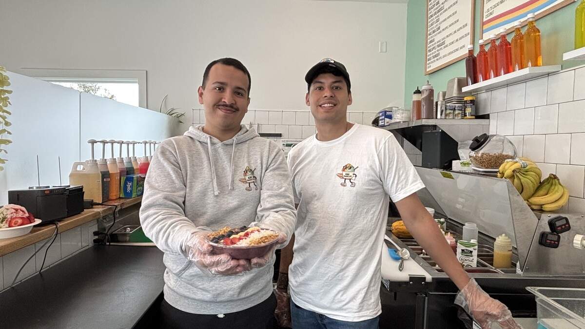 Co-owners Alejandro Flores and Hector De La Fuente pose with the Makai acai bowl. Kai Shave Ice had its soft opening June 18, seen here on July 1, 2026.