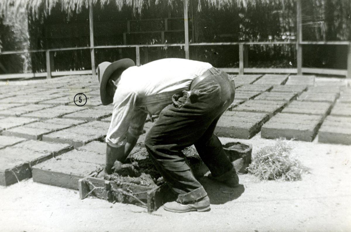 Adobe replacement bricks dry in the sun in this photo by Rocky Dana on Aug. 1, 1934.