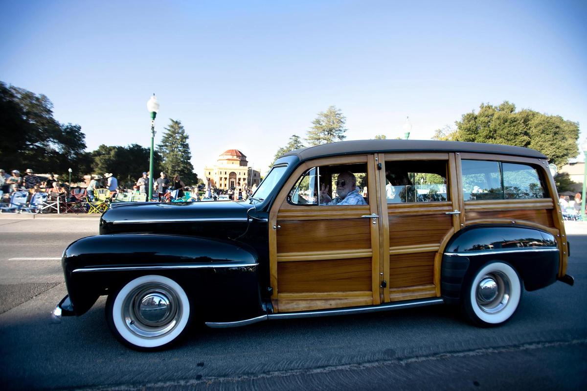 Classic cars parade in front of Atascadero’s City Administration Building during Hot El Camino Cruise Nite on Friday, Aug. 19, 2022. More than 500 cruisers participated in the event, now in its 29th year.