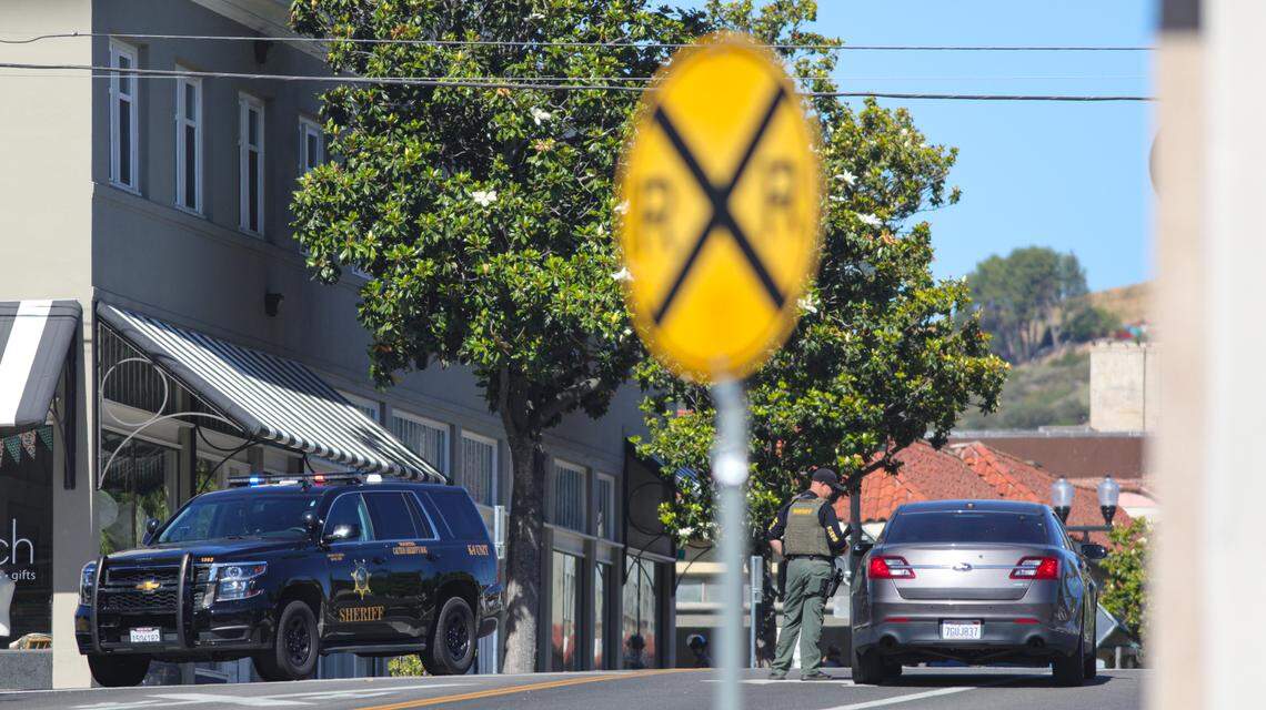 San Luis Obispo County sheriff deputies maintain a perimeter at 13th Street in Paso Robles near the railroad tracks on Wednesday, June 10, 2020, after a gunman shot a deputy and fired at the police station. 