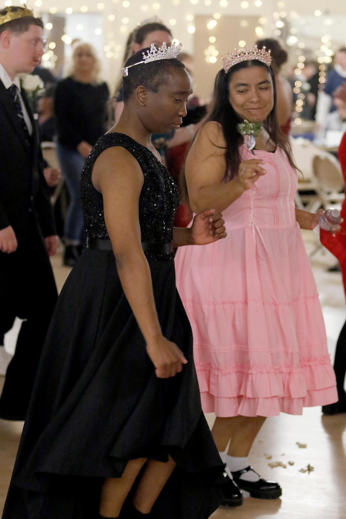 Kimberly Williams and Laura Solano, right, dance to the Macarena at the “Let Your Light Shine” Special Education Prom in Atascadero on Friday, March 7, 2025. This special education event aims to provide a night of fun, joy, and celebration for individuals with disabilities, giving them the opportunity to enjoy the prom experience in an accessible and supportive environment.