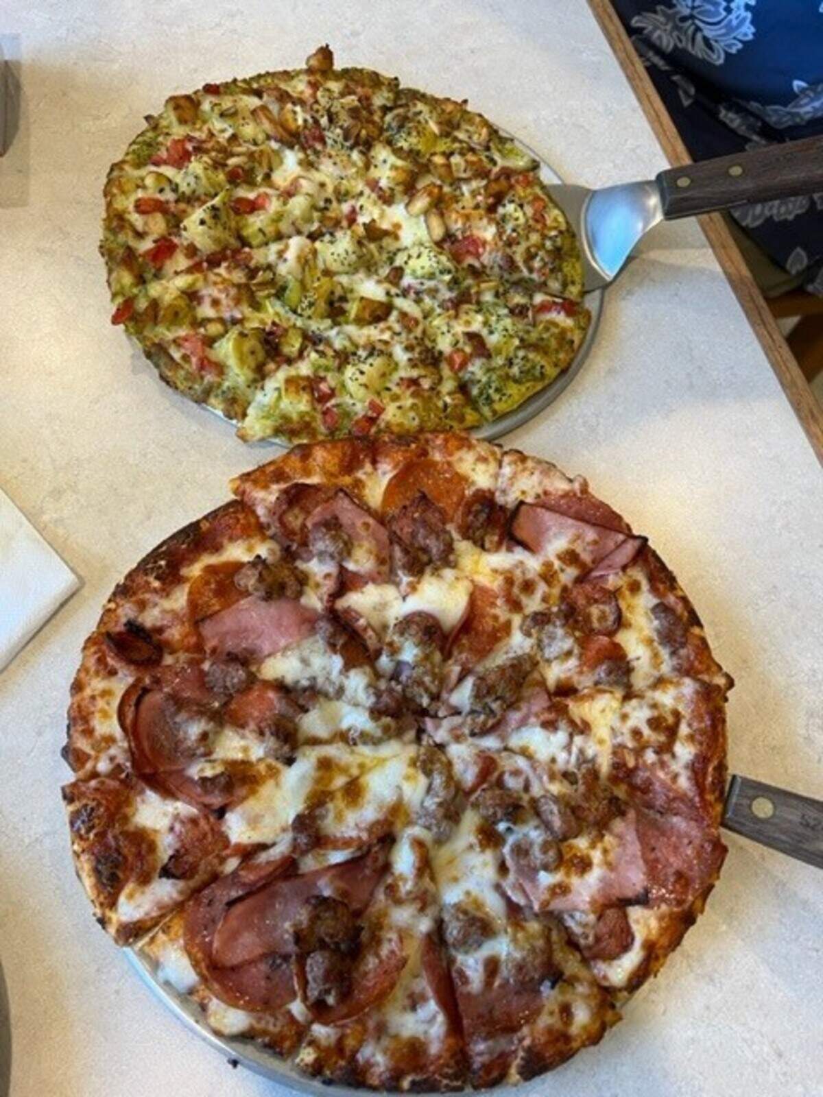 Marv’s Pizza and Sports Bar in Paso Robles is owned by former USC basketball coach Bob Cantu.
