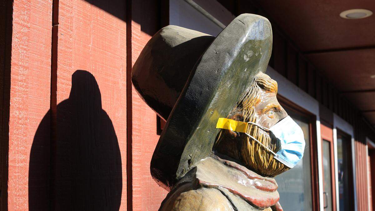 A statue at the western-themed Mid-State Fairgrounds wears a mask as the facility serves as a site for SLO County’s COVID-19  vaccination and testing programs.