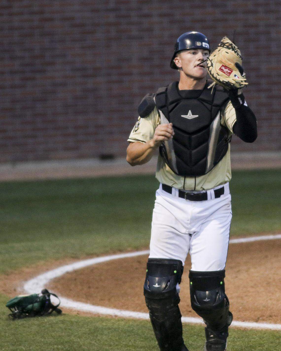 Ryan Tayman confirms the catch of a foul popup, he graduated from Arroyo Grande High School. Washington State beat Cal Poly 5-4 on Feb. 23, 2026.