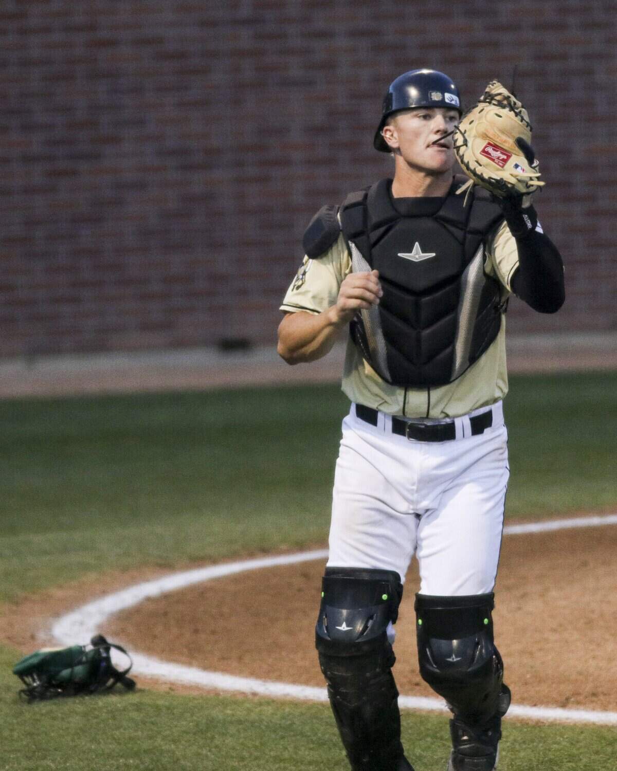 Ryan Tayman confirms the catch of a foul popup, he graduated from Arroyo Grande High School. Washington State beat Cal Poly 5-4 on Feb. 23, 2026.