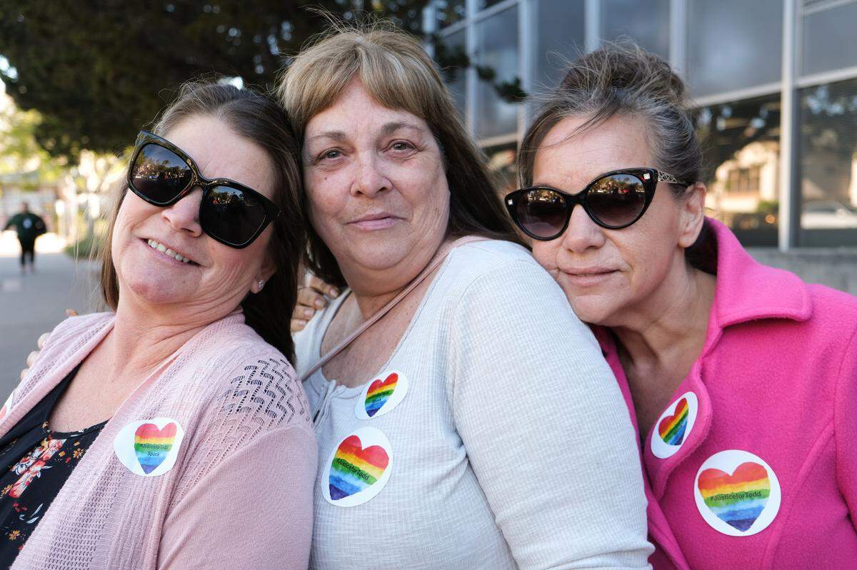 From left to right, Kristi Myrick, Melody Pinion and Jennifer Del Rio stand outside San Luis Obispo Superior Court following Tyler Stevens arraignment on Dec. 18, 2024. Stevens was charged with murdering Pinion’s son, Todd Pinion, in an alleged hate crime on Oct. 23, 2024.