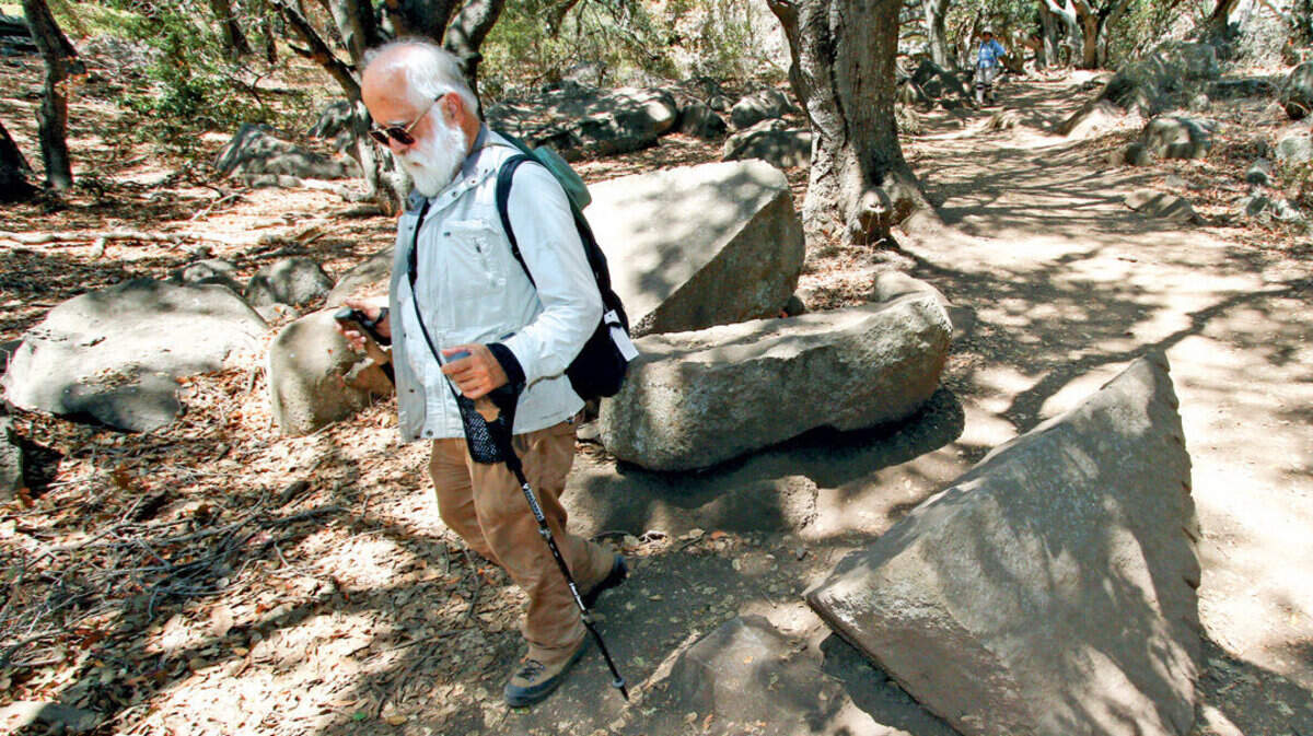Alan Houser hikes a little ahead of wife Helene Gordon. They celebrated their 37-year anniversary hiking Bishop Peak on Thursday.