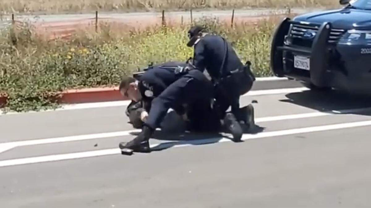 An unidentified San Luis Obispo Police Department officer punched a man in the head while arresting him July 17, 2022. He is now on paid leave, police say.