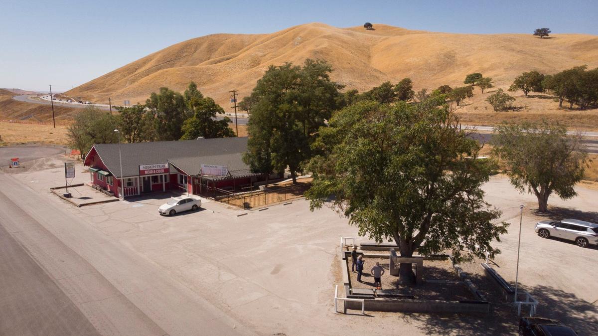 James Dean memorabilia collector Neil Sheehan is organizing an effort to restore the 1977 memorial to the famed movie star. Memorial at lower right. The star died east of Cholame in a 1955 car wreck. The site has been bypassed by a road upgrade to Highway 41/46 that aims to prevent collisions like Dean’s.
