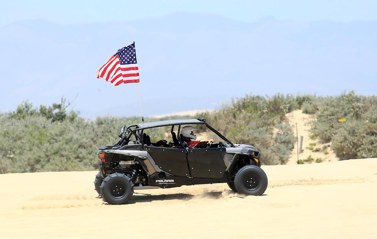 Riders ride in the off-highway vehicle area of Oceano Dunes State Vehicular Recreation Area near Pismo Beach on Saturday, June 29, 2019.