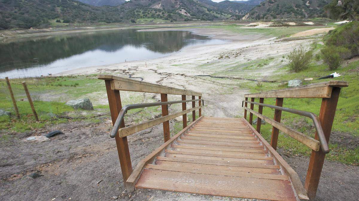 Recent rains have done little to replenish Lopez Lake. On Dec. 19, 2014, this stairway that normally reaches the water's edge was far from the water.