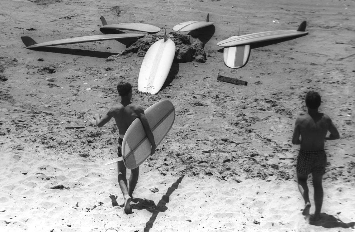 Surfers take their boards to Avila Beach March 15, 1965.