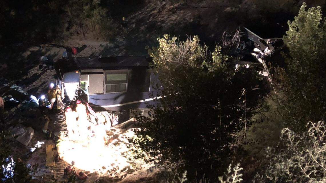 A tour bus carrying members of country singer Josh Turner’s road crew drove off Highway 46 near McMillan Canyon Road, killing one person and injuring seven others.