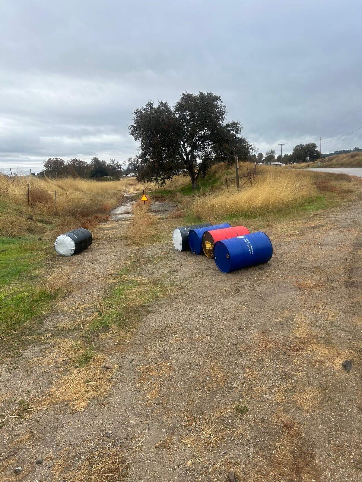 Steel drums of hazardous waste were found at a roadside turnout at Monterey Road near Paso Robles on Dec. 18, 2024. Four of the barrels contained benzene, a substance SLO County Public Works said is flammable, toxic and an environmental pollutant.