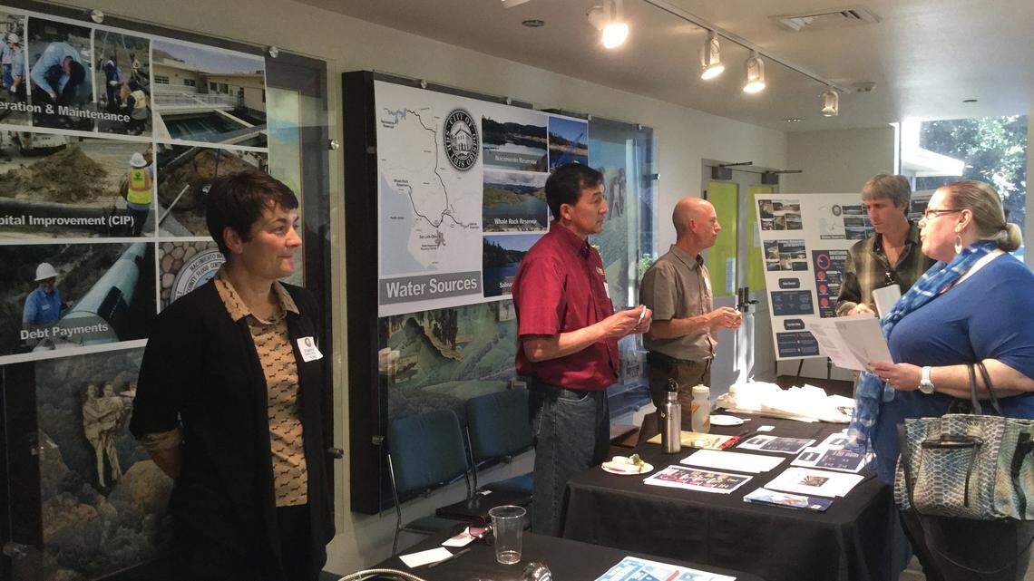 Residents get information about the city's limited water supply and ways to conserve water at a meeting Thursday night in San Luis Obispo.