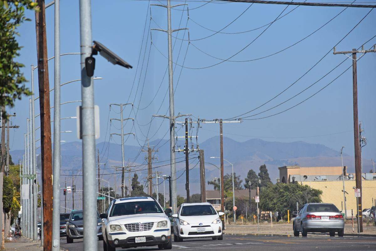 A license plate reader camera sits on a pole along West Battles Road in Santa Maria. The Santa Barbara County Sheriff’s Office plans to install 25 automated license plate readers throughout the county and will use the data for criminal investigations.