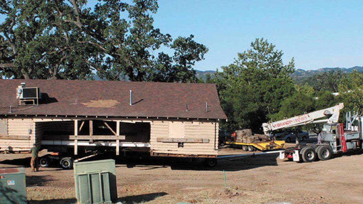 A historic cabin in Atascadero got a lift Monday to a new home near the library.