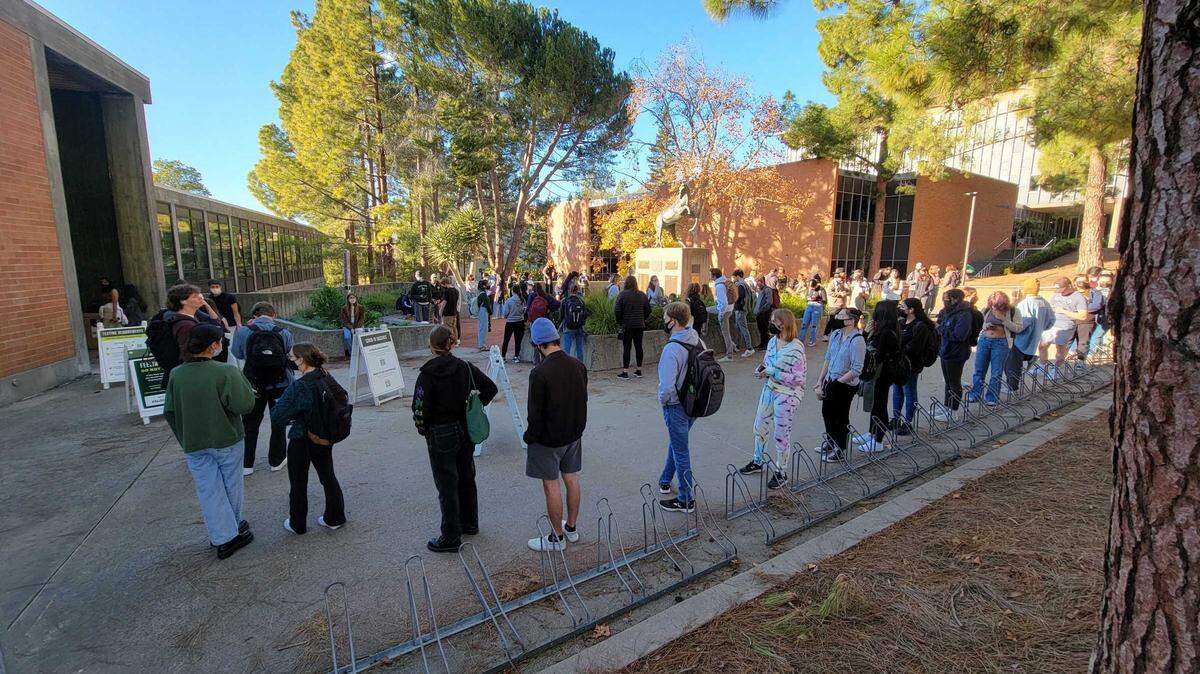 Cal Poly students wait in a long line for COVID-19 tests on Jan. 4, 2022. Students were required to get tested during the first week of the winter quarter.