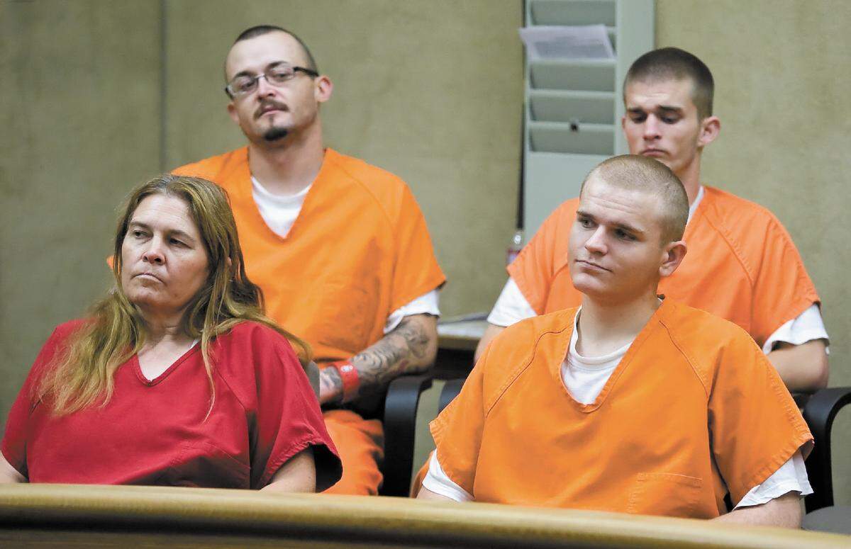 Four of the five defendants — clockwise from front left, Rhonda Maye Wisto, Ty Michael Hill, Jason Adam Greenwell and Frank Jacob York — listen in court during their arraignment Thursday, Sept. 30, 2010, in San Luis Obispo.