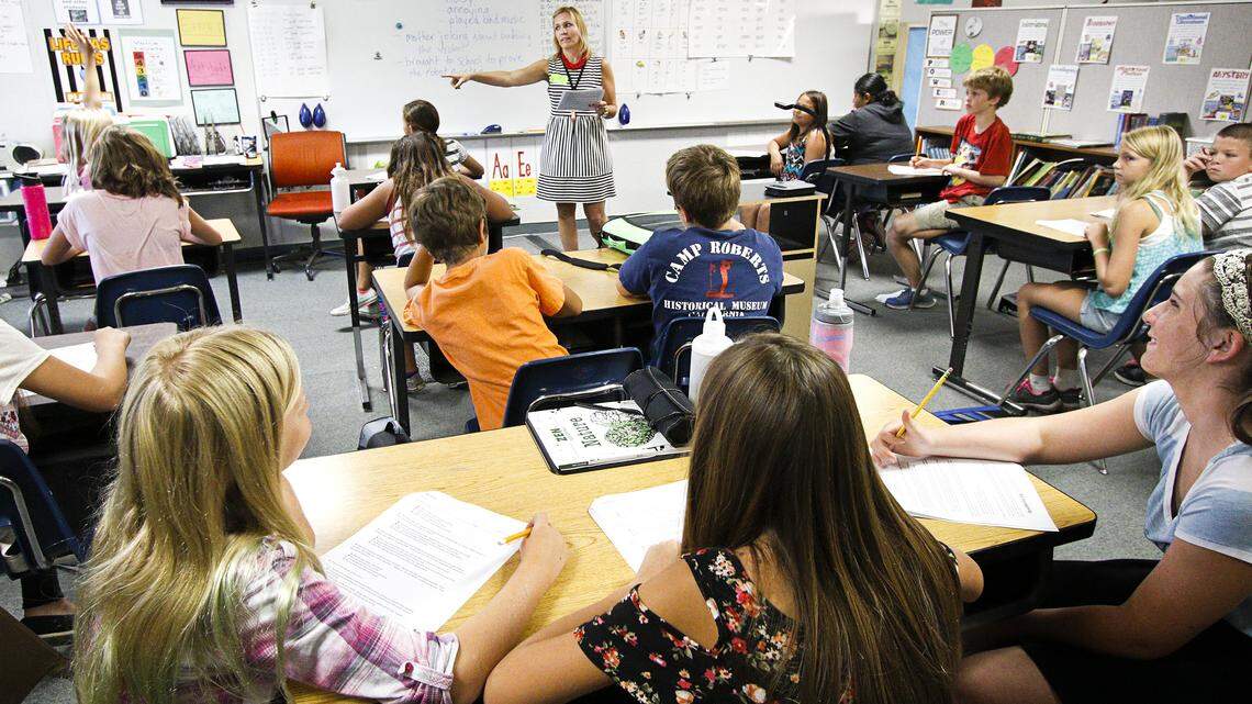 San Gabriel Elementary School sixth grade teacher Denise Moore talks to her class at San Benito Elementary School, where students have been studying since the closure of San Gabriel earlier this month.