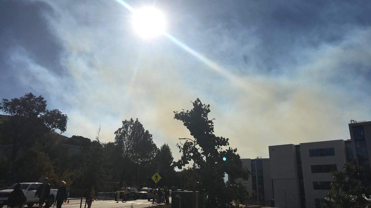 Smoke from the fires in Reservoir Canyon reached the Cal Poly campus on Sunday morning. The university is experiencing a power outage caused by the fires.
