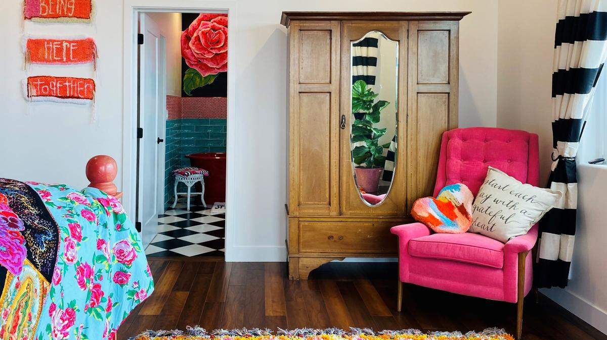 Roses are a motif in the master suite of Barb and Jeri Saia’s Los Osos home. 
