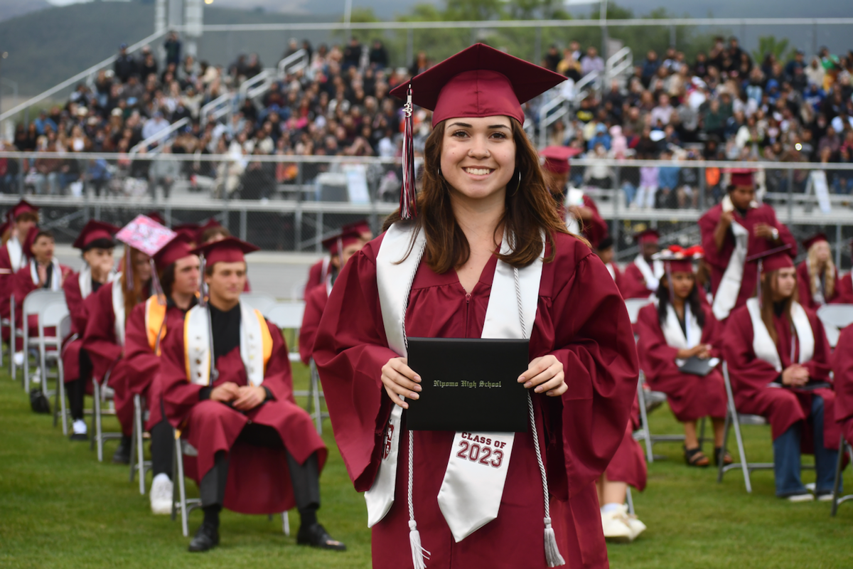 Karissa Courtenay smiles after picking up her diploma at Nipomo High School’s graduation ceremony on June 9.