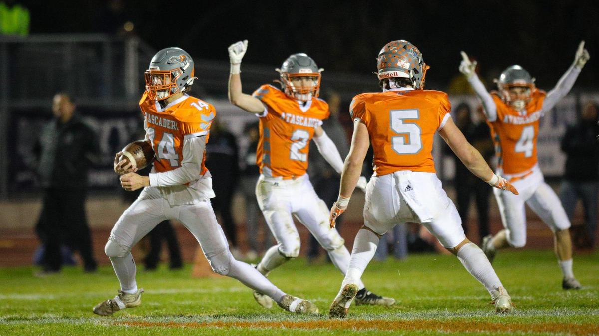 Mason Degnan seals the game with an interception as Greyhounds celebrate. Atascadero High School beat Pioneer Valley 27-13 to win the Division V, 2022 CIF Central Section Football Championships Nov. 25, 2022.