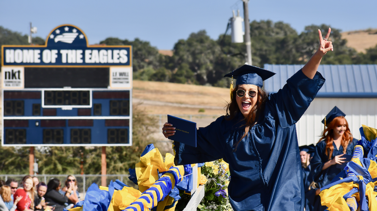 Anaiah Caudill celebrates her graduation at Arroyo Grande High School’s ceremony on Saturday.