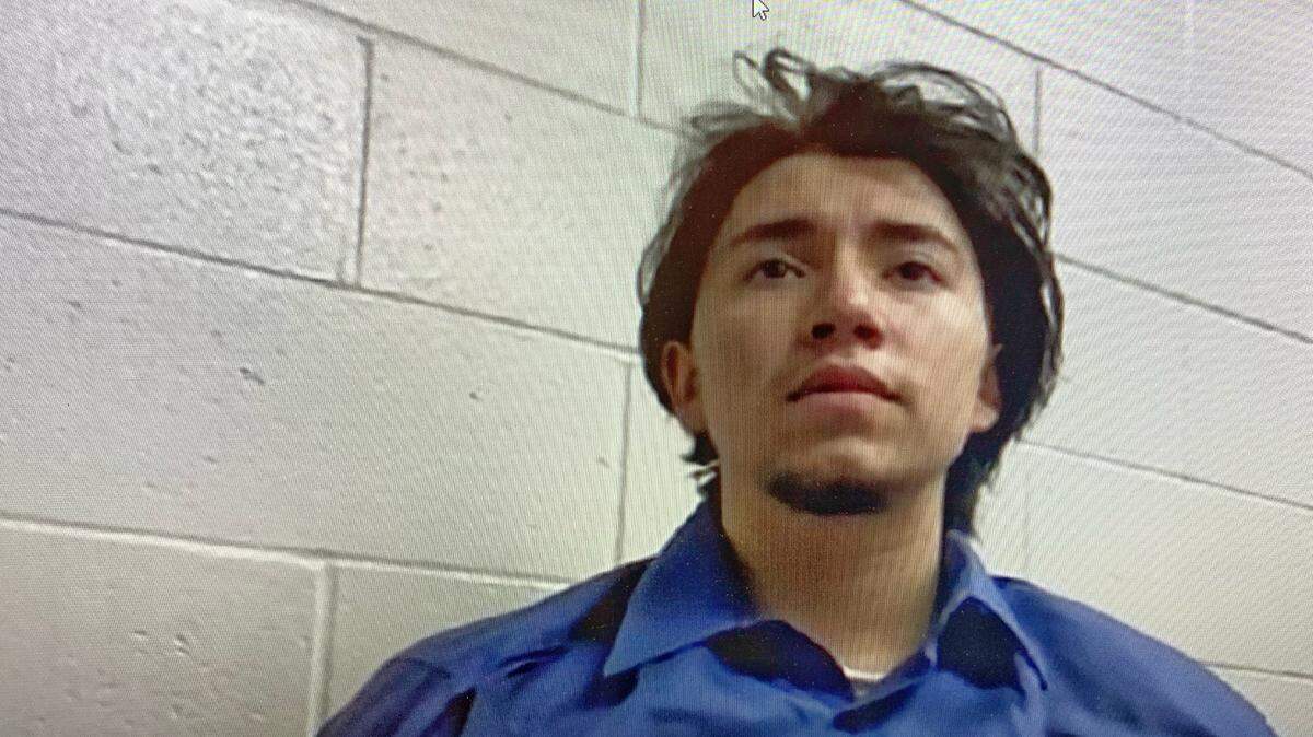 Kayonie Eliaz Mendibles, 18, of Fresno listens during his arraignment in December 2020, via video conference from County Jail. He was charged with murder in the death of Jeanine Vore of Arroyo Grande.