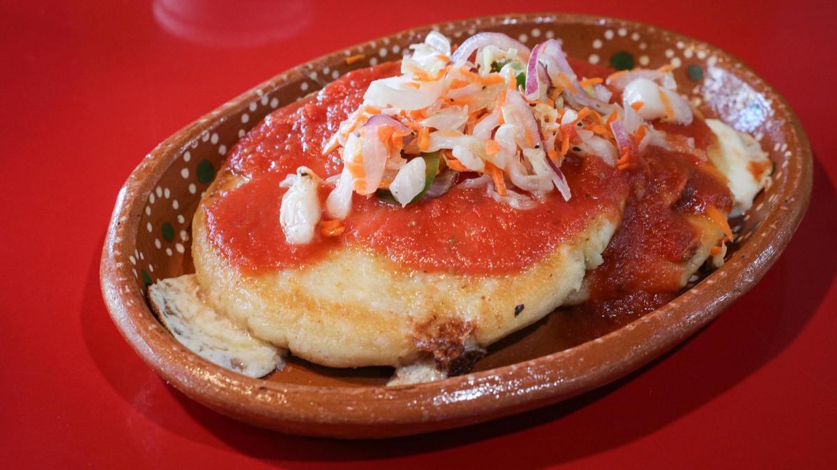 Pupusa is a thick griddle cake stuffed with fillings like beans or cheese topped with salsa and pickled vegetables. Dishes are made from scratch to order. Azteca Market in Atascadero is a Mexican-Guatemalan fusion restaurant and market seen here Nov. 30, 2023.