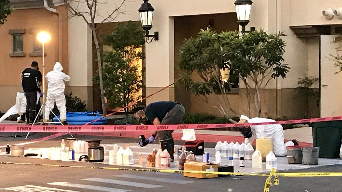 Investigators remove evidence of a suspected drug lab discovered Tuesday in the boiler room of the Courtyard by Marriott hotel in Goleta.