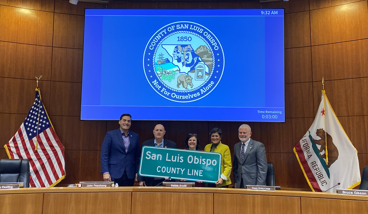 Debbie Arnold’s fellow county supervisors presented her with a San Luis Obispo County Line sign at her last Board of Supervisors meeting on Dec. 17, 2024, to thank her for 12 years of service as the District 5 Supervisor. Arnold will retire in the new year.