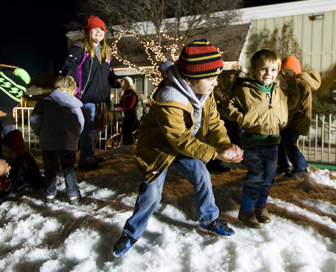 Kids throw snowballs during the Atascadero Winter Wonderland event in 2013.