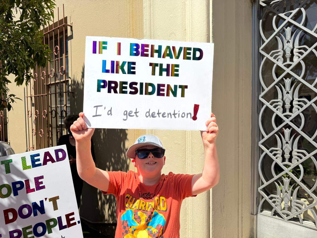 Jamie Jacobson, a 12-year-old Los Osos Middle School student, attended his first protest rally in San Luis Obispo on Saturday, April 5.