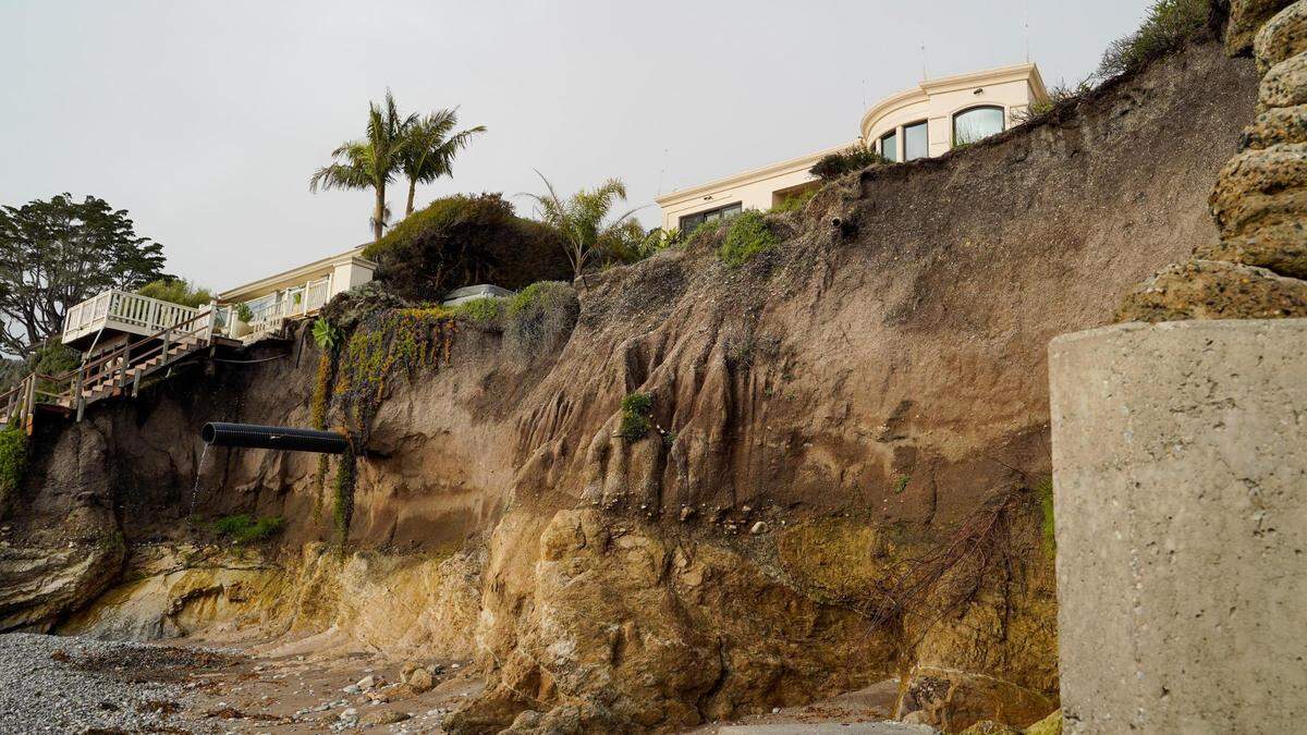 Marilee and Tony Hyman are worried their home on Shell Beach’s coast is in danger of being damaged as the bluff below erodes. Pictured here is their neighbor’s home, which does not have any protection from a seawall.
