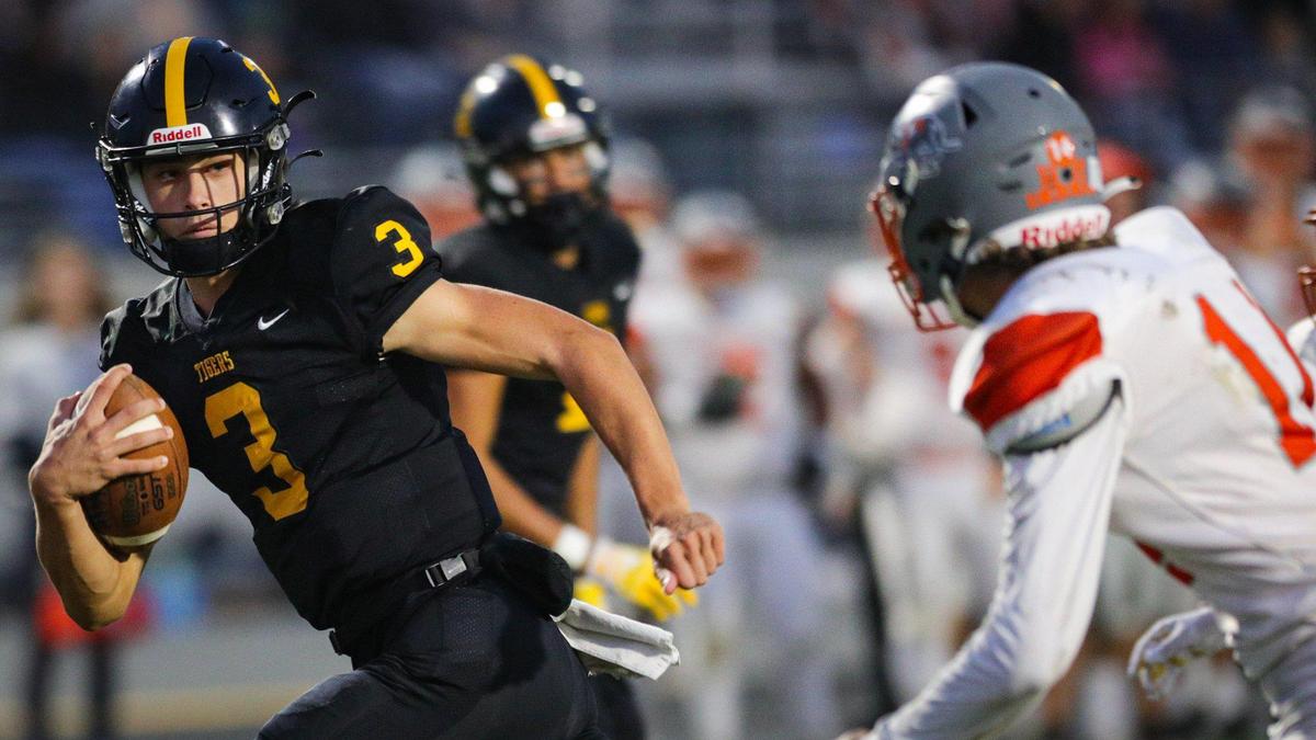 Jace Gomes runs for a touchdown while being pursued by Tyler Bukamier. Atascadero beat San Luis Obispo 21-20 in an Ocean League football game in SLO on Sept. 22, 2023.