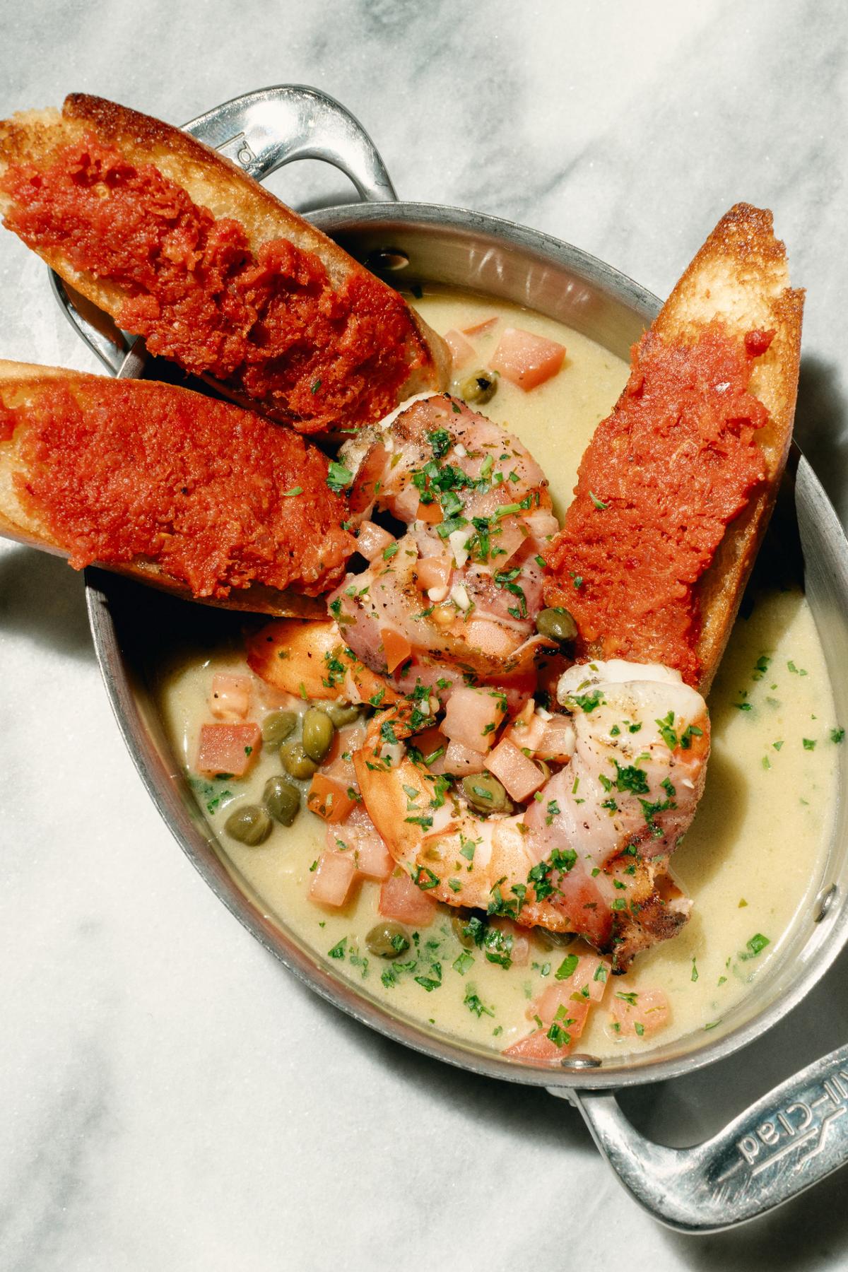 The prawns picarra are pancetta-wrapped prawns served with creamy salami spread on sliced baguette at Nate’s on Marsh in San Luis Obispo.