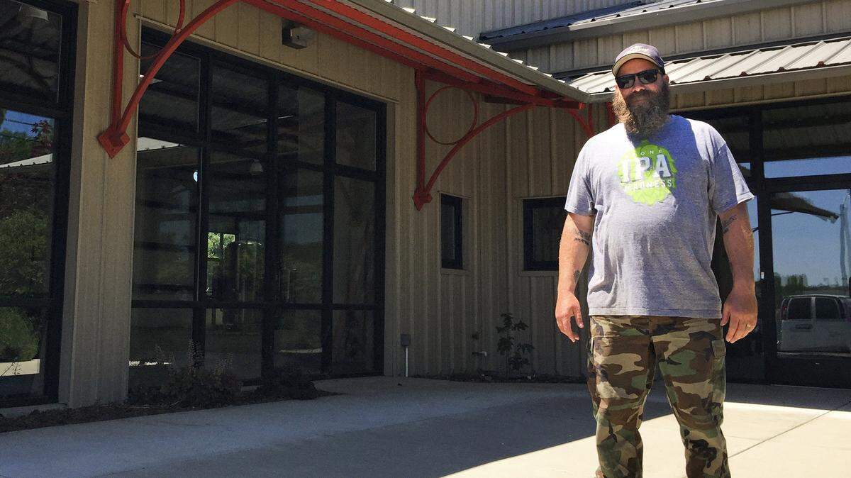 Chris Chambers, owner of Dunbar Brewing, stands outside his new brewhouse and tasting room at 22815 El Camino Real in Santa Margarita on Tuesday, June 2. The new brewhouse and tasting room is set to open this summer. 
