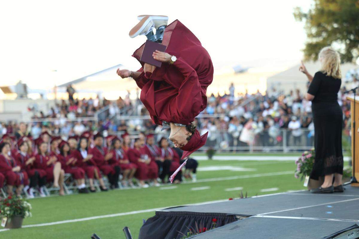Cameron Henry landed a backflip after picking up his diploma at Paso Robles High School.