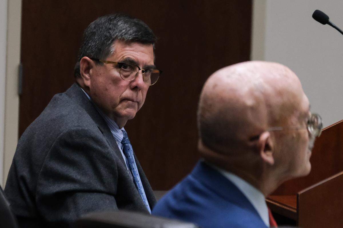 Paso Robles City Councilmember Chris Bausch looks at Karl Olson, attorney for The Tribune, during a case management conference for the Tribune’s public records act lawsuit against Bausch and the City of Paso Robles on April 9, 2025.
