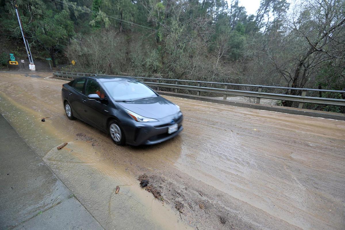 The Burton Drive bridge was covered in mud over Santa Rosa Creek in Cambria. A huge storm has unleashed flooding in areas around Cambria.