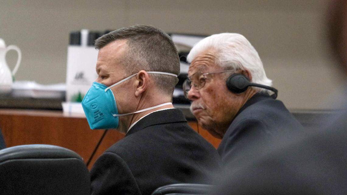 Paul Flores, left, and his father Ruben Flores listen during day two of pretrial motion hearings in the Kristin Smart murder case in the Monterey County Superior Court in Salinas on June 7, 2022.