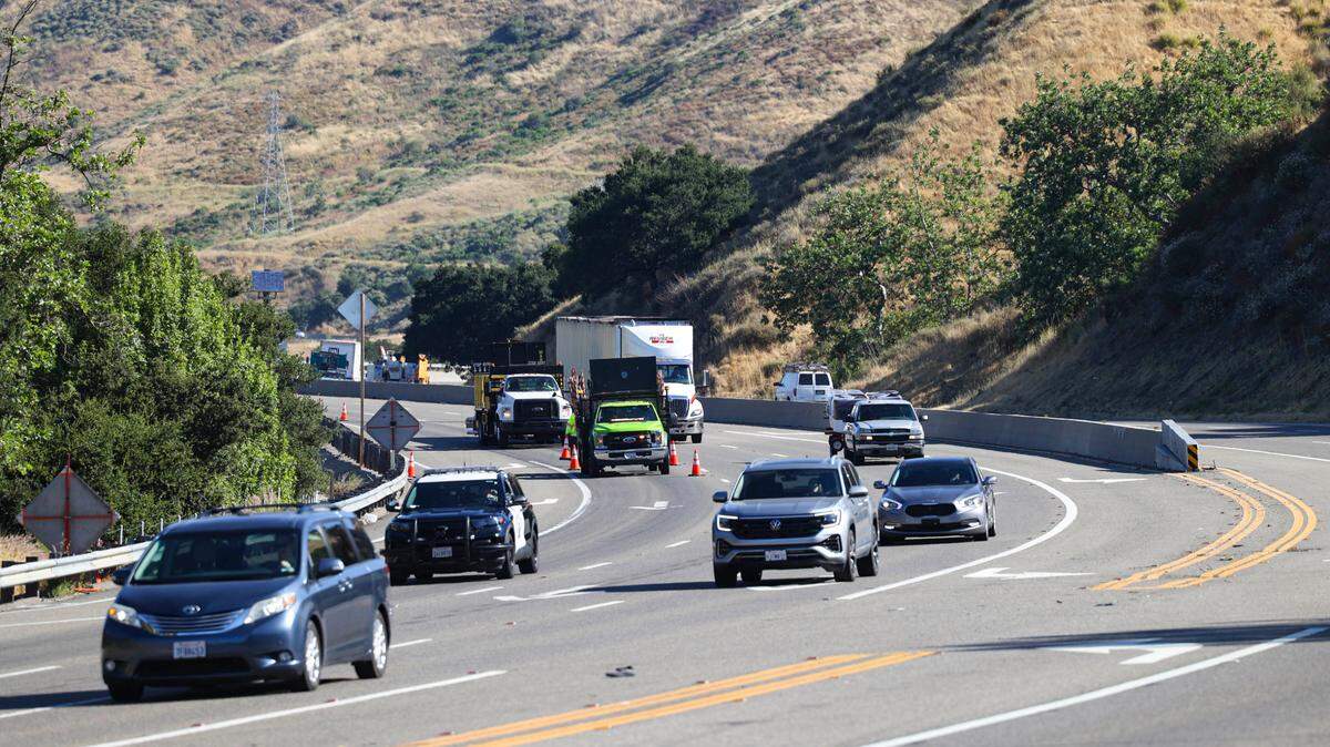 The right lane of southbound Highway 101 is closed for one mile near Old Stage Coach at the bottom of the Cuesta Grade as Caltrans works on a rockfall fence project on July 9, 2024.