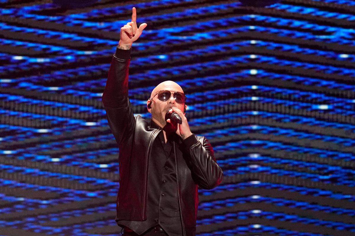 Pitbull performs on the first night of the 2022 iHeartRadio Music Festival on Friday, Sept. 23, 2022, in Las Vegas. The rapper will perform at the California Mid-State Fair in Paso Robles on Wednesday, July 26, 2023.