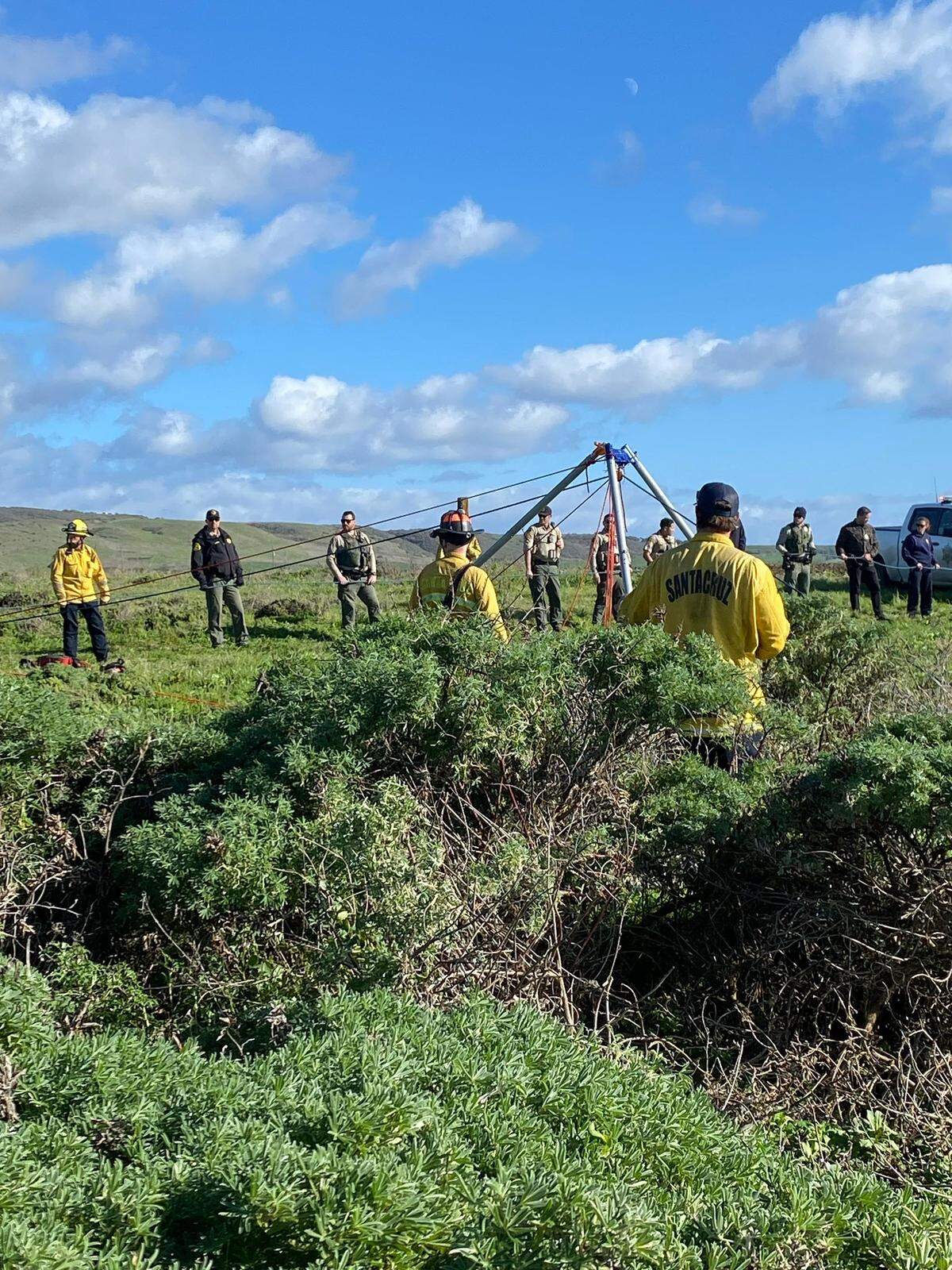 Firefighters with Cal Fire CZU recovered a body from a beach south of Davenport on Saturday, Dec. 27, 2025. Firefighters used a rope system to bring the body from the beach to the bluffs. Family members identified the body as Erica Fox, who went missing on Dec. 21 while swimming in the ocean off Pacific Grove.
