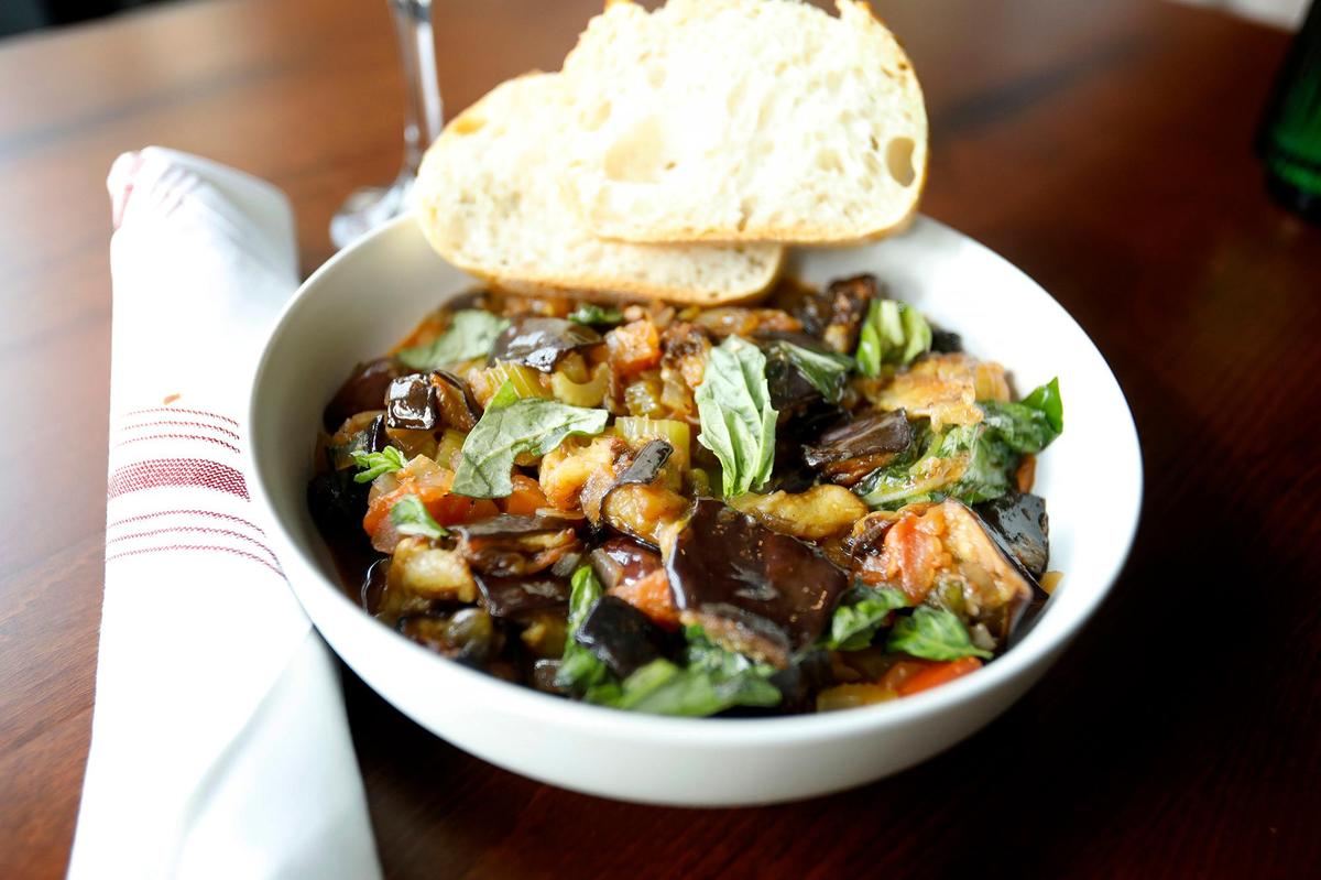This dish is caponata, a traditional Sicilian sweet and sour eggplant agrodolce relish. Luca’s Sicilian Wine & Deli is open in Arroyo Grande with Sicilian dishes and family flair.